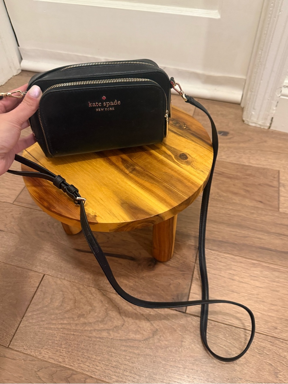 kate spade black leather crossbody camera bag with gold logo